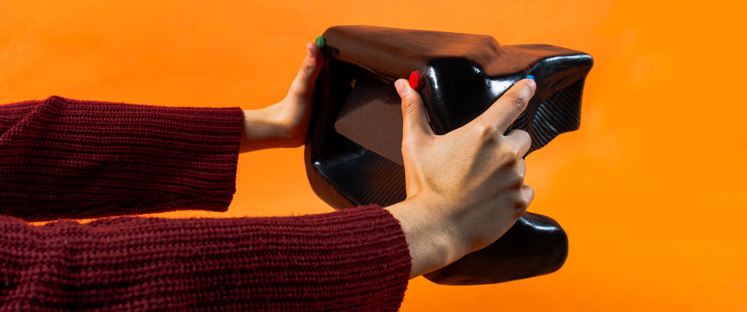 Proxima held with both hands — front position